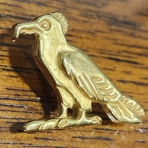 Vintage MMA 1976 bird pendant